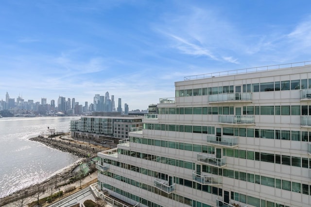 property's view of city with a water view