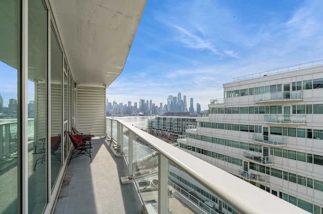 balcony featuring a view of city