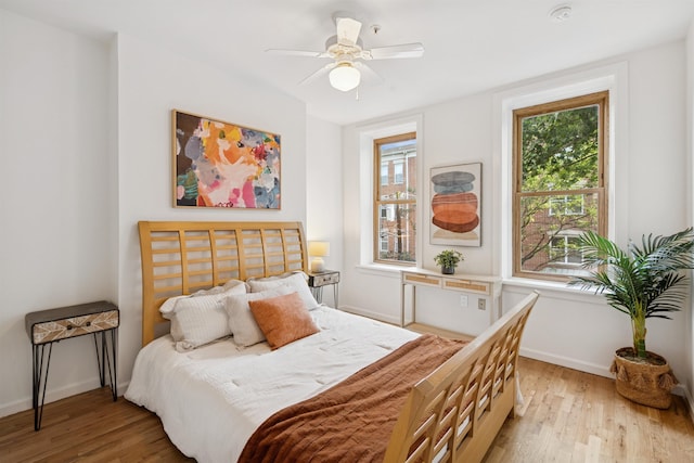110 Morris St Unit 301, Jersey City, NJ 07302 - bedroom with light wood-style floors and ceiling fan