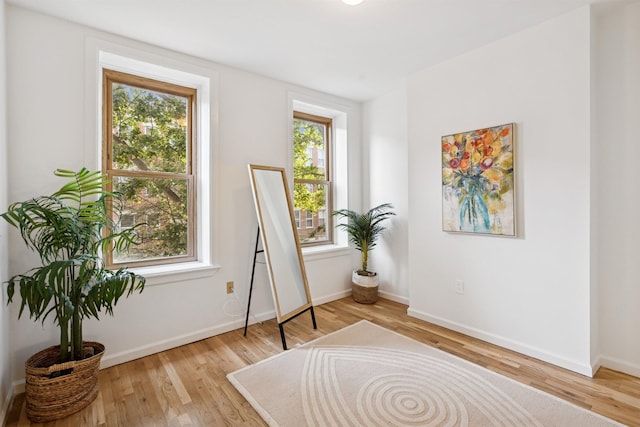 110 Morris St Unit 301, Jersey City, NJ 07302 - sitting room featuring plenty of natural light and wood finished floors