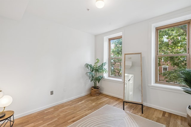 110 Morris St Unit 301, Jersey City, NJ 07302 - sitting room featuring wood finished floors and plenty of natural light