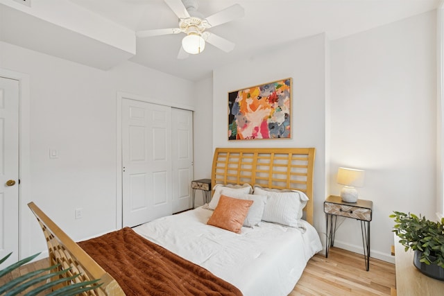 110 Morris St Unit 301, Jersey City, NJ 07302 - bedroom with wood finished floors, a closet, and a ceiling fan