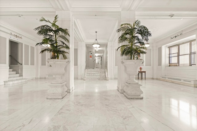 2600 Kennedy Blvd Unit 1H, Jersey City, NJ 07306 - common area featuring a decorative wall, ornamental molding, stairs, and a wainscoted wall