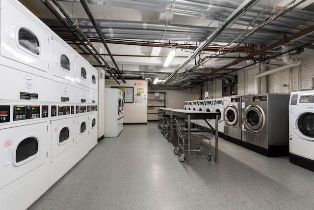 2600 Kennedy Blvd Unit 1H, Jersey City, NJ 07306 - community laundry with separate washer and dryer, estacked washer and dryer, and tile patterned floors