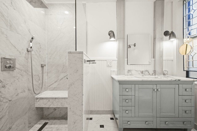 2600 Kennedy Blvd Unit 1H, Jersey City, NJ 07306 - full bathroom featuring a tile shower, vanity, and wainscoting