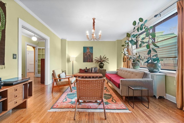 2600 Kennedy Blvd Unit 1H, Jersey City, NJ 07306 - living area featuring crown molding, a chandelier, and wood finished floors