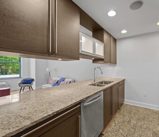 10 Regent St Unit 209X, Jersey City, NJ 07302 - kitchen with a sink, stainless steel dishwasher, baseboards, dark brown cabinetry, and recessed lighting