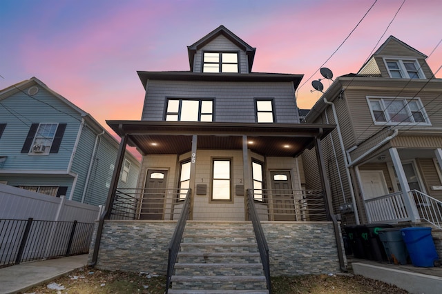 view of front of property featuring covered porch