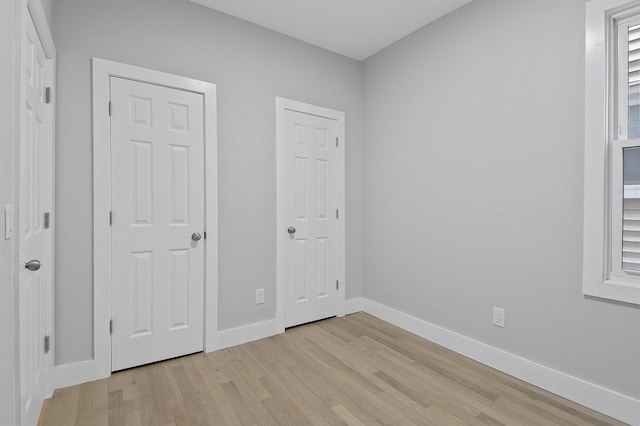 unfurnished bedroom featuring light hardwood / wood-style flooring