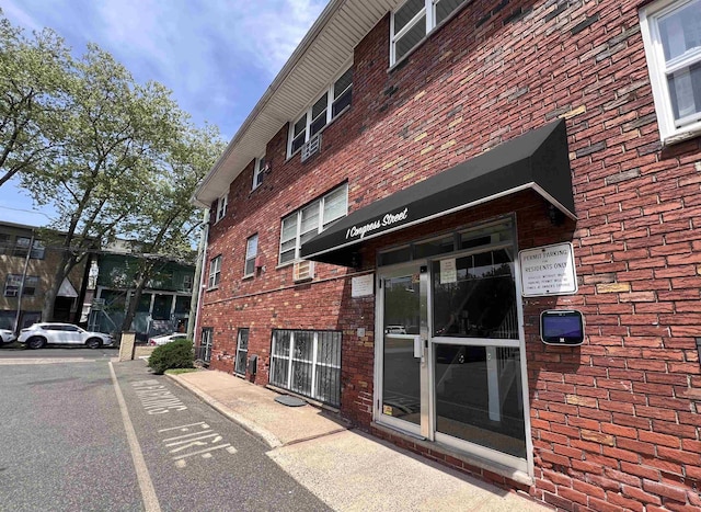 1 Congress St Unit 304, Jersey City, NJ 07307 - view of building exterior with uncovered parking