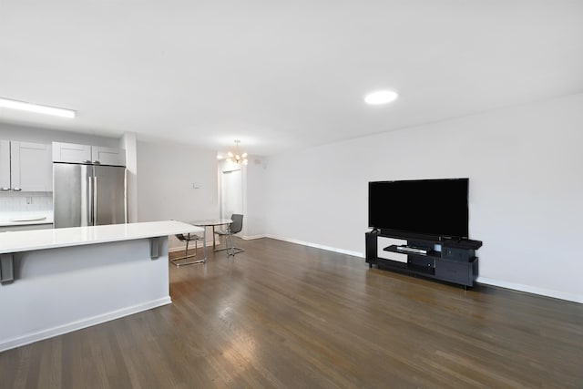 1 Congress St Unit 304, Jersey City, NJ 07307 - unfurnished living room featuring dark wood-type flooring, a chandelier, and recessed lighting
