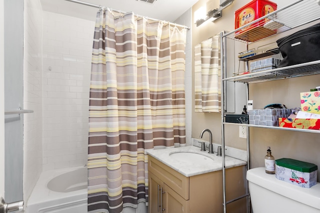 bathroom with shower / bath combo, visible vents, vanity, and toilet