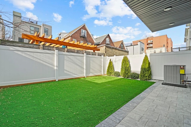 81 Webster Ave Unit 1, Jersey City, NJ 07307 - view of yard featuring central AC unit and a patio area