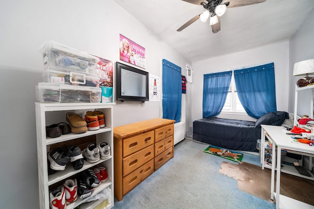 bedroom with carpet floors and a ceiling fan