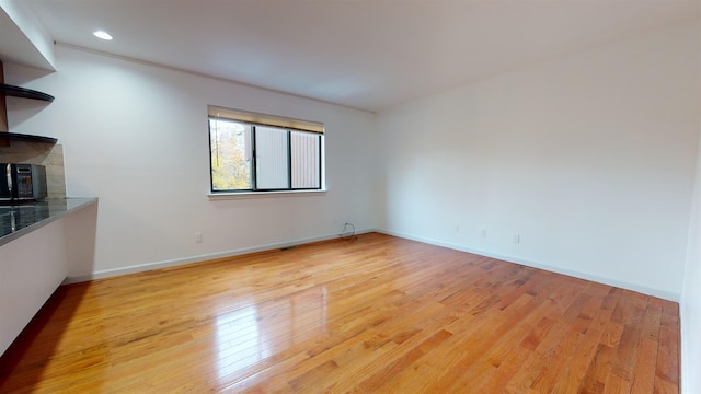 602 Sanderling Ct Unit 602, Secaucus, NJ 07094 - empty room featuring baseboards, light wood-type flooring, and recessed lighting