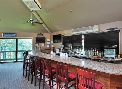 602 Sanderling Ct Unit 602, Secaucus, NJ 07094 - bar featuring a ceiling fan, carpet, and a dry bar