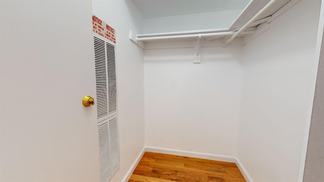 602 Sanderling Ct Unit 602, Secaucus, NJ 07094 - walk in closet featuring a heating unit and wood finished floors