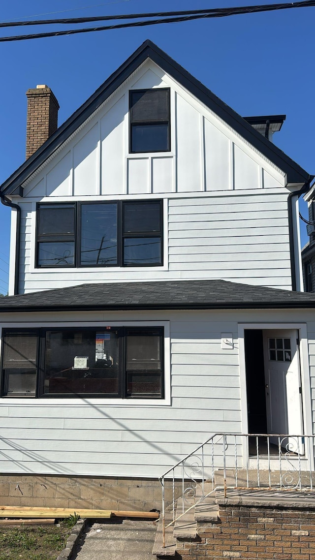 228 Oakwood Ave, Kearny, NJ 07032 - view of property exterior with a chimney