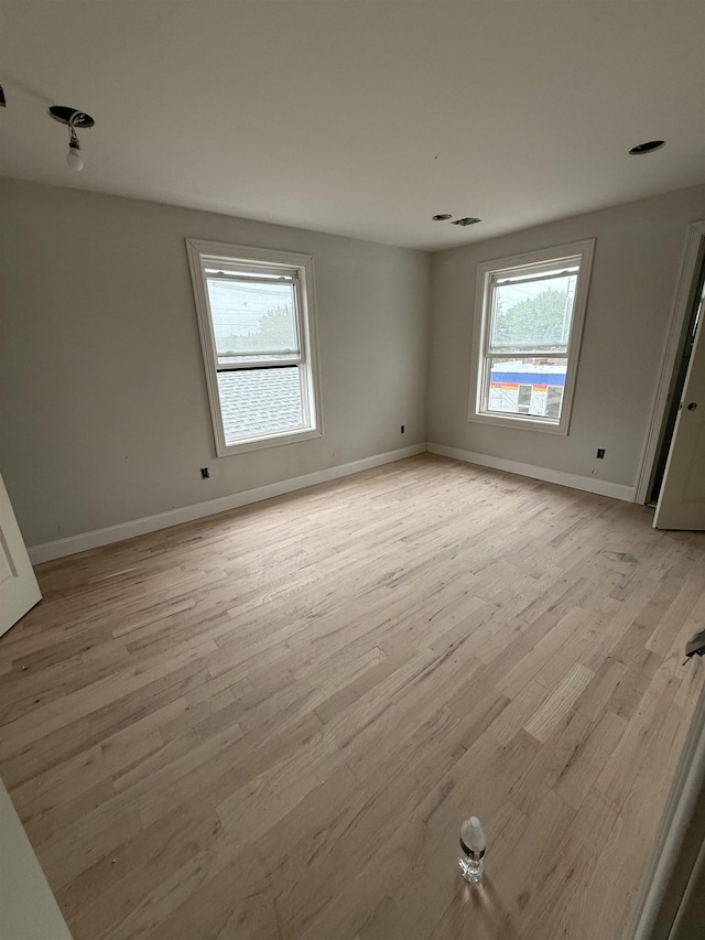 228 Oakwood Ave, Kearny, NJ 07032 - spare room featuring light wood finished floors and baseboards