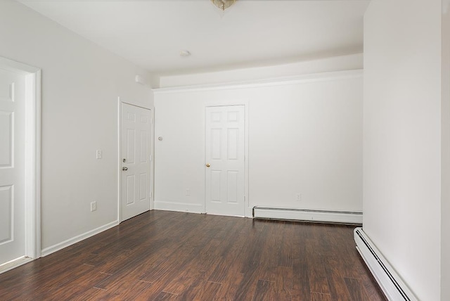 69 Belmont Ave, Jersey City, NJ 07304 - unfurnished room with baseboard heating and wood finished floors