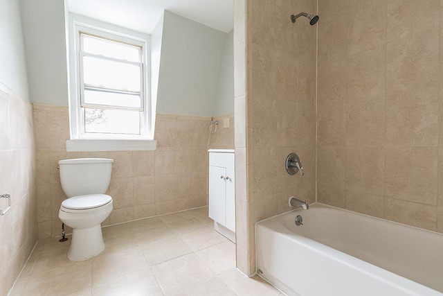 69 Belmont Ave, Jersey City, NJ 07304 - full bathroom featuring tile walls, toilet, tub / shower combination, wainscoting, and vanity