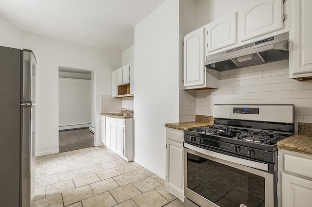 69 Belmont Ave, Jersey City, NJ 07304 - kitchen featuring stainless steel appliances, under cabinet range hood, a sink, a baseboard radiator, and backsplash