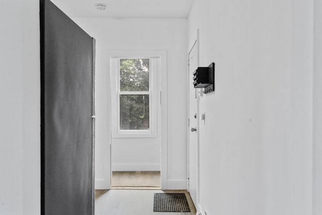 51 Lord Ave, Bayonne, NJ 07002 - doorway to outside with wood finished floors and baseboards