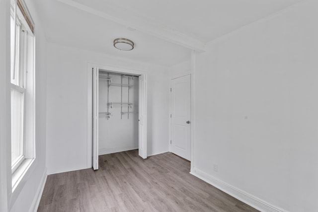 51 Lord Ave, Bayonne, NJ 07002 - unfurnished bedroom with wood finished floors and a closet
