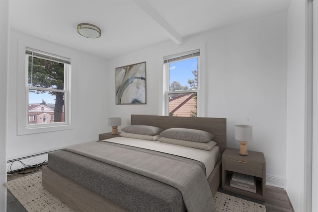 51 Lord Ave, Bayonne, NJ 07002 - bedroom featuring multiple windows, beamed ceiling, and wood finished floors