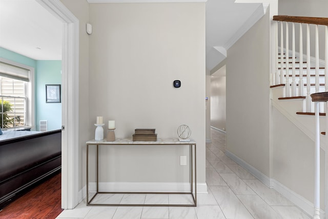 129 Roosevelt Dr, Wood-Ridge, NJ 07075 - hallway with stairway, baseboards, and light marble finish flooring