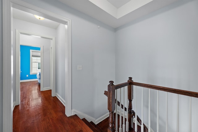 129 Roosevelt Dr, Wood-Ridge, NJ 07075 - hallway with an upstairs landing, dark wood-type flooring, and baseboards