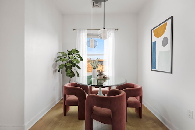 sitting room with hardwood / wood-style floors