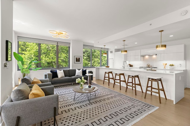 9 Ave At Port Imperial # 524, West New York, NJ 07093 - living room featuring light wood-style flooring and recessed lighting
