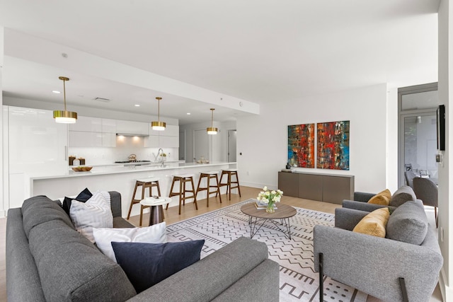 9 Ave At Port Imperial # 524, West New York, NJ 07093 - living area featuring light wood-style floors, recessed lighting, and baseboards