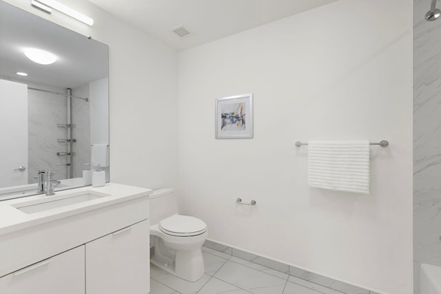 9 Ave At Port Imperial # 524, West New York, NJ 07093 - bathroom featuring marble look tiles, toilet, a shower, vanity, and baseboards