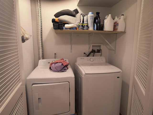 laundry room featuring washing machine and dryer