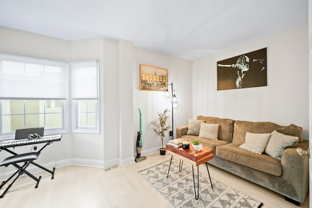 319 The Promenade, Edgewater, NJ 07020 - living room featuring light wood finished floors and baseboards