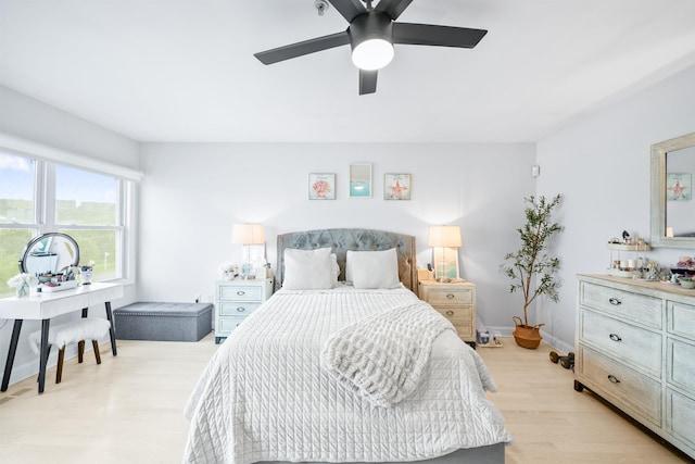 319 The Promenade, Edgewater, NJ 07020 - bedroom with light wood-style flooring and ceiling fan