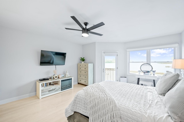 319 The Promenade, Edgewater, NJ 07020 - bedroom featuring access to exterior, light wood-type flooring, and a ceiling fan