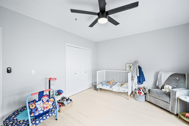 319 The Promenade, Edgewater, NJ 07020 - bedroom featuring wood finished floors, a closet, and ceiling fan