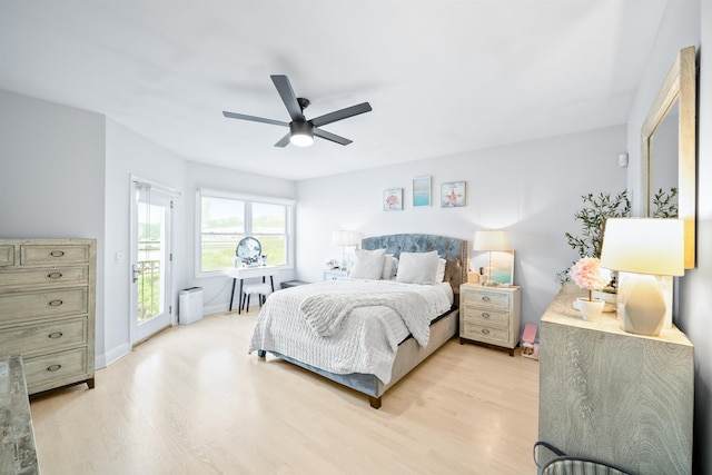 319 The Promenade, Edgewater, NJ 07020 - bedroom with light wood-style floors, access to outside, and ceiling fan