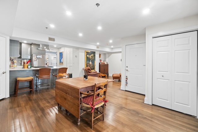 dining space featuring light hardwood / wood-style flooring