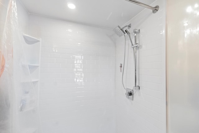 bathroom with a shower with shower curtain