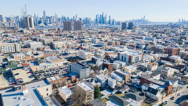 drone / aerial view featuring a city view