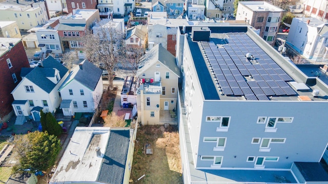 birds eye view of property with a residential view