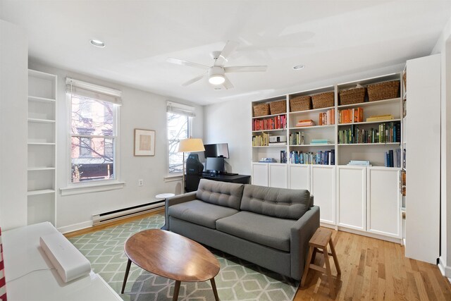 607 1st St Unit 2F, Hoboken, NJ 07030 - living room with light wood-style flooring, a baseboard radiator, recessed lighting, and ceiling fan
