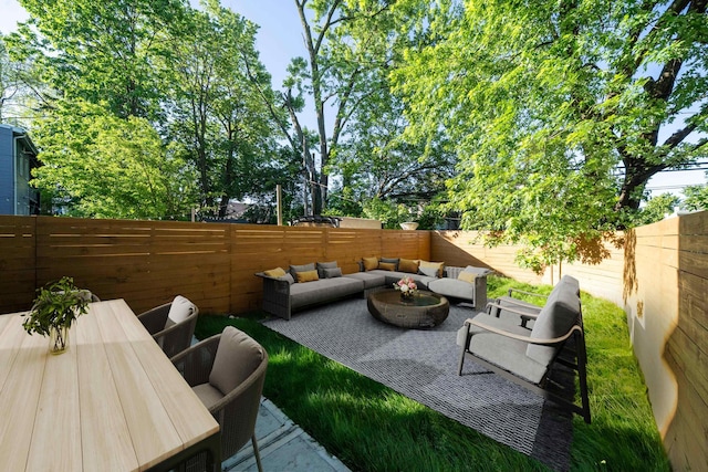 247 Harrison Ave Unit 1, Jersey City, NJ 07304 - fenced backyard featuring outdoor lounge area, outdoor dining area, and a patio