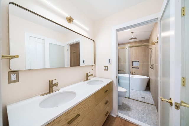 247 Harrison Ave Unit 1, Jersey City, NJ 07304 - full bath featuring double vanity, a freestanding bath, and tiled shower