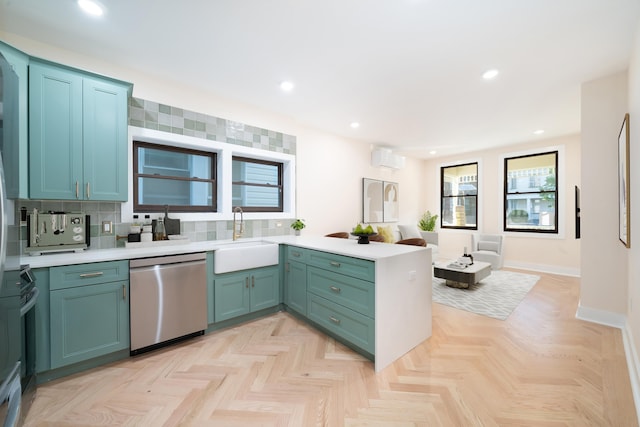 247 Harrison Ave Unit 1, Jersey City, NJ 07304 - kitchen with dishwasher, a peninsula, tasteful backsplash, light countertops, and recessed lighting