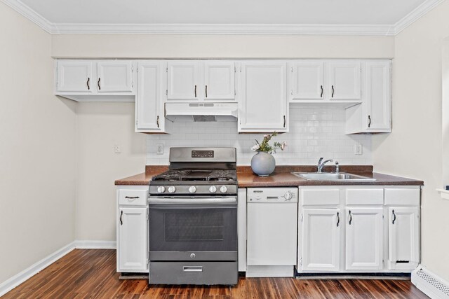 3600 Charles Ct Unit 23, North Bergen, NJ 07047 - kitchen with stainless steel gas range, dishwasher, under cabinet range hood, dark countertops, and ornamental molding